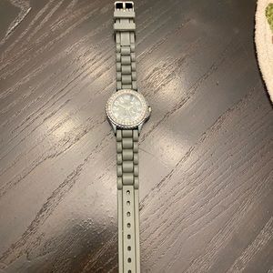 Grey Geneva watch, stainless steel back, water resistant, silicone band